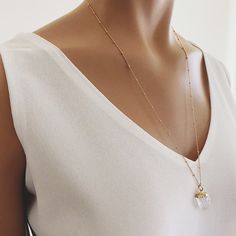 Genuine chunky raw quartz necklace on long 14k gold filled satellite chain Perfect for layering, bridesmaids gifts, gift for wife, bff, you Gemstone: Genuine Quartz Pendant Size: 19x11mm Bezel: Vermeil Gold Chain: Satellite Chain: 14K Gold Filled with spring ring clasp Chain: 1mm Length: 24 inches About "Gold Filled Jewelry": Also called rolled-gold. These jewelry items are not actually filled with gold. They are made of a base metal covered by sheets of gold in a mechanical bonding process. Eff Gold Crystal Healing Necklaces 14k Gold Filled, Gold Elegant Charm Necklaces For Healing, Delicate Crystal Gemstone Necklaces For Wedding, Elegant 14k Gold Filled Crystal Necklace With Adjustable Chain, Delicate Crystal Necklace As Gift, Elegant 14k Gold-filled Crystal Necklace Gift, Delicate Crystal Gemstone Necklace For Wedding, Dainty Gold Crystal Necklace For Wedding, Delicate 14k Gold Filled Crystal Necklaces For Gift