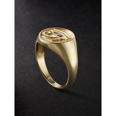 Jacquie Aiche's 'Eye of Horus' signet ring is engraved with an image of the ancient Egyptian symbol, which is believed to promote well-being, healing and protection. It's handcrafted from gold that's polished to a high shine and set with a single blackened diamond. Symbolic Yellow Gold Rings For Ceremonial Occasions, Symbolic White Gold Signet Ring For Formal Occasions, Symbolic Engraved Ring For Anniversary, Symbolic Oval Jewelry For Formal Occasions, Symbolic Oval Engraved Ring For Ceremonial Occasions, Symbolic Diamond Rings With Engraving, Symbolic Engraved Diamond Rings, Luxury Engraved Ring With Single Diamond, Spiritual Yellow Gold Engraved Oval Ring