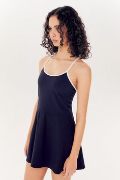 Our latest sport dress features skinny straps and a built in short. The ultra luxe Airweight fabric is perfect for summer. Built-in support with a scoop front and racerback. BEST FOR: Court sports, spin class, cycling, gym workouts and other mid impact workouts.Model Stats:Height: 5’9”, Bust: 32.”5, Waist: 23.5”, Hips: 35”Wearing size: Small Spin Class, Sport Dress, Tank Dress, Gym Workouts, Cycling, Gym, Sports, How To Wear, Fabric