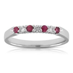 Rubies and diamonds in a classic band, makes this ring perfect for an anniversary or wedding. Fine Jewelry White Ruby Ring, Fine Jewelry Diamond White Ruby Ring, Fine Jewelry Ruby Ring With Round Cut Diamond, Elegant White Gold Ruby Ring With Half Eternity, White Ruby Ring In Fine Jewelry Style, Anniversary Eternity Band With Diamond Accents, Ruby Ring With Diamond Accents Fine Jewelry, Diamond Accents Eternity Band For Anniversary, Elegant Ruby Half Eternity Promise Ring