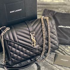 Saint Laurent Medium Monogram Quilted Leather Shoulderbag In Black And Silver Details Luxury Flap Bag With Branded Hardware, Luxury Tan Flap Shoulder Bag, High-end Black Flap Bag With Dust Bag, Designer Business Flap Bag, Designer Black Flap Bag For Shopping, Luxury Black Flap Bag For Shopping, Luxury Black Flap Bag With Branded Hardware, Black Leather Luxe Bag, Black Luxe Leather Bag