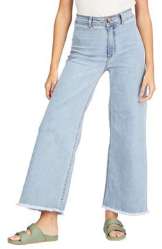 High-rise trouser jeans are ready for a stroll by the beach in light-wash, low-stretch denim with frayed hems and an easygoing wide-leg silhouette. Zip fly with button closure Back patch pockets 98% cotton, 2% elastane Machine wash, tumble dry Imported Women's Clothing Faded Bottoms With Frayed Hem For Fall, Fall Cutoff Light Wash Flare Jeans, Fall Light Wash Cutoff Flare Jeans, Light Wash Flare Jeans With Frayed Hem For Spring, Cutoff Light Wash Flare Jeans For Fall, Summer Flare Jeans With Frayed Hem, Trendy Summer Flare Jeans With Relaxed Fit, Trendy Light Wash Cropped Jeans With Frayed Hem, High-rise Faded Jeans With Frayed Hem