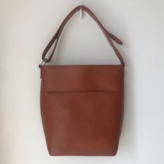 Brand New With Tag! Vegan Leather! Adjustable Strap! Brown Bucket Bag For On-the-go, Classic Brown Hobo Bag For Daily Use, Everyday Brown Bucket Bag With Removable Pouch, Brown Rectangular Bucket Bag For On-the-go, Brown Bucket Hobo Bag With Adjustable Strap, Cognac Bucket Bag For On-the-go, Everyday Bucket Hobo Bag With Detachable Strap, Everyday Use Hobo Bag With Detachable Strap, Classic Dark Tan Shoulder Bag With Adjustable Strap