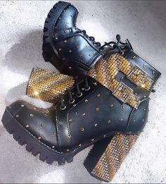 Tudor Queendom Costume Boots (Inspired by Six The Musical) Custom designs available!  Example boots are for the character of Catherine of Aragon. Catherine of Aragon boots include the colour's Bronze, Gold and Rose Gold. Shoe size, heel height, colours and gem types (e.g. standard rhinestones or Swarovski) can all be made to order and if you wish to have your own pair customised this can be arranged, this price includes the double rhinestoned buckle. Contact me with any questions or queries and I've be happy to do them. All made with non-toxic and washable glue.  Please not the dispatch time when you order - if you need them more urgently please send me a message. *Not official merchandise and the designs from the show will not be copied * The price stated is to cover material and labour c Gold Boots With Round Toe For Winter, Winter Boots With Rhinestone Rivets And Round Toe, Gold Heeled Boots With Reinforced Heel And Round Toe, Trendy High Heel Boots For Festival, Six The Musical Boots, Gold Boots With Reinforced Heel And Round Toe, Gold Ankle Boots For Winter, High Heel Winter Festival Boots, Leather Boots With Rhinestone Rivets And Round Toe