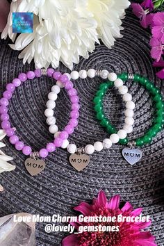 Here is listing for ONE dainty bracelet in 6mm bead size with your choice of natural gemstone: green chalcedony, white howlite or lavender chalcedony, with love mom heart charms. All metal parts are of no tarnish stainless steel. These delicate mom charm bracelets in white, green and lavender colors, look absolutely gorgeous and feminine. Would be a great gift for your mother, wife, sister, grandma and a new mom.
• Please follow us for updates on:
Instagram, Pinterest & Tik Tok @lovely_gemstones Delicate Gold Bracelet, Green And Lavender, Purple Jewelry, Bracelet Dainty, White Howlite, 40th Birthday Gifts