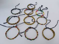 Adjustable Friendship Rasta bracelet for any size.Cotton braided thread. Casual Multicolor Hand-wrapped Friendship Bracelets, Casual Black Woven Friendship Bracelets, Casual Woven Bracelets For The Beach, Casual Braided Beaded Bracelets As Gift, Casual Braided Beaded Bracelets For Gift, Casual Braided Bracelet Jewelry, Casual Braided Bracelet, Casual Multicolor Woven Braided Bracelets, Casual Multicolor Woven Braided Bracelet