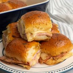 ham and cheese sliders stacked on top of each other