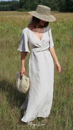 Elegant Beach Wrap Dress, Elegant Linen Maxi Dress For Brunch, Chic Evening Linen Maxi Dress, Elegant Short Sleeve Wrap Dress For Beach, Linen Chic Maxi Dress, Summer Wrap Linen Maxi Dress, Elegant Wrap Dress For Vacation, Elegant Linen Dress With Surplice Neckline, Elegant Fitted Wrap Dress For The Beach