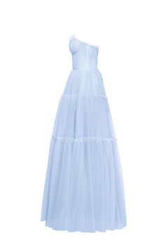 Dreamy tulle dress in light blue color with a light ruffled tulle maxi skirt. This dress has a heart-shaped boned semi-transparent bodice with built-in cups and a corset back, which makes the silhouette fitted and elegant. The A-line maxi skirt is made from multiple layers of delicate tulle that emphasize the hourglass silhouette. The waistline is adorned with a silver belt with Milla’s signature. Details: Material: Tulle Fabric composition: 100% Polyester, 100% Nylon Sleeve style: Sleeveless Silhouette: A-line Skirt length from waist: 116 cm / 45.6 inches Dress weight: 1.14 kg / 2.5 lbs Neckline: Heart-shaped neckline Back: Lacing closure Lining: Light blue full-length flared underskirt Model is: 180 cm / 83-60-95, wearing size S Art.N.: 9000-10 Light Blue Asymmetrical Dress Casual, One Shoulder Dress Long, Tulle Maxi Dress, Tulle Maxi Skirt, Dress Weights, Wedding Guest Style, Rush Dresses, Hourglass Silhouette, Silver Belt