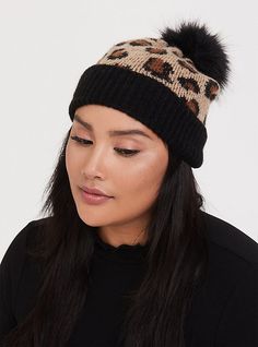 This purr-fectly soft beanie features a leopard print, black ribbed trim and a black faux fur pom-pom up top. Acrylic/polyester. Wash cold; dry flat. Imported. The best plus size women's leopard & black faux fur pom beanie beanies in multi. Torrid is your destination for cozy fall and winter clothes to keep you warm and comfortable. Casual Winter Hat With Faux Fur Trim, Black Faux Fur Hat For Fall, Casual Fall Beanie With Pom Poms, Faux Fur Beanie Hats For Fall, Faux Fur Beanie For Fall, Fall Faux Fur Beanie Hat, Trendy Fall Hats With Faux Fur Lining, Casual Faux Fur Beanie Hat, Casual Faux Fur Beanie