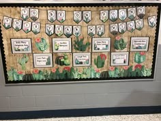 a bulletin board is decorated with cactus and flowers for the teacher's classroom display