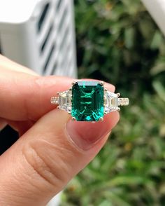 ------------------------------------------------------------------------------ ❤ Product Information ❤ ------------------------------------------------------------------------------ Brilliant 3.55CT Lab Created Emerald Center Engagement Ring,Minimalist Style Anniversary Ring,Promise Ring For Female,14K Yellow Gold Ring ✥ 𝐌𝐚𝐢𝐧 𝐒𝐭𝐨𝐧𝐞 𝐃𝐞𝐭𝐚𝐢𝐥𝐬 ↣ Shape:  Emerald Cut ↣ Type: Genstone ↣ Weight: 3.55 Carat (App.) ↣ Dimension: 8x11 MM (App.)  ↣ Color: Colorless ↣ Clarity: AAAA+ ↣ Making Process: Handmade - Crafted by our experienced team ✥ 𝐒𝐢𝐝𝐞 𝐒𝐭𝐨𝐧𝐞 𝐃𝐞𝐭𝐚𝐢𝐥𝐬 ↣ Shape: Trapezoid Shape ↣ Type: Moissanite ↣ Weight: 0.80 Carat (App.) ↣ Color/: Colorless/ VVS-VS ↣ Options: Lab Grown Diamond and Natural Diamond (Possible on request while placing an order and Extra Chargeabl Emerald Engagement Ring Green, Engagement Ring Minimalist, May Birthstone Rings, Emerald Wedding Rings, Emerald Rings, Minimalist Engagement Ring, Emerald Cut Rings, Gemstone Engagement, Emerald Engagement