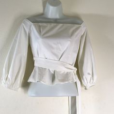 Lucy Paris White Square Neckline Balloon 3/4 Sleeve Over Shoulder Top Side Wrap Tie Crop Top Woman's Pull On Side Zip Crop Size Small Nwot Pit To Pit 16" Length 14" Thank You For Checking Out My Closet! We Love To Bundle And Offer Discounts, Please Make Sure To Take A Peek At Our Other Listings! If You Have Any Questions, Please Feel Free To Ask, We Are Here To Help! Tie Crop Top, White Square, Square Necklines, Square Neckline, Side Zip, Shoulder Top, Crop Tops Women, Balloons, Color White