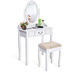 a white dressing table with a stool and mirror on it's side, next to a flower vase