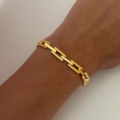 Deadstock gold-plated bracelet. Gold-tone Paperclip Bracelet With Rectangular Links, Gold Chain Cuff Bracelet Gift, Gold Chain Cuff Bracelet As Gift, Trendy Gold Bracelet With Rectangular Links, Everyday Rectangular Gold-tone Jewelry, Rectangular Yellow Gold Metal Jewelry, Gold Chain Cuff Bracelet, Adjustable Gold Paperclip Bracelet With Rectangular Links, Gold Cuff Bracelet With Chain Detail