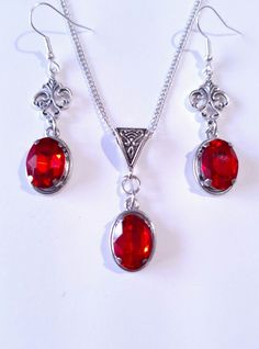 Victorian Ruby red Silver jewelry set Ruby red set necklace earrings Victorian jewelry set Bohemian set Vintage style set Red jewelry set Gothic wedding jewelry set  Silver Red Victorian set necklace earrings . Bohemian necklace and earrings . Beautiful Set of silver-tone Antique style ornaments and Ruby red crystals cabochons necklace and earrings. Silver  tone pendant Victorian style necklace and earrings. Gothic jewelry set. Boho necklace. Bohemian necklace and earrings. Romantic necklace and Nickel Free Red Jewelry For Wedding, Elegant Handmade Red Jewelry, Nickel Free Red Jewelry For Valentine's Day, Red Jeweled Jewelry For Valentine's Day, Red Jewels Jewelry For Valentine's Day, Red Ruby Jewelry For Valentine's Day, Ruby Jewelry With Earrings For Valentine's Day, Handmade Ruby Jewelry Sets In Elegant Style, Red Costume Jewelry For Valentine's Day