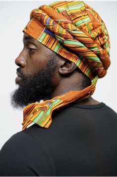 Imagining the vibrant colors of the African landscape, our uniquely crafted 100% cotton Kente Turban, affectionately named "Asase" after the Ghanaian earth goddess, is a true masterpiece by Dupsie's African Fashion. This pre-wrapped Turban in Orange, Green, Black, Off-White, Blue, and Burgundy African Print showcases the rich history and culture of African fashion, securing its place as a must-have accessory for men. The tradition of Turbans in African fashion dates back centuries, symbolizing n Fitted Multicolor Headwrap For The Beach, Multicolor Summer Turban, One Size Fits Most, Multicolor Turban Headband For Beach, Cotton Turban With Matching Headband, Fitted Multicolor Headwrap With Matching Headband, Multicolor Turban With Matching Headband For Beach, Traditional Adjustable Summer Turban, Fitted Multicolor Headwrap For Summer, Adjustable Traditional Summer Turban