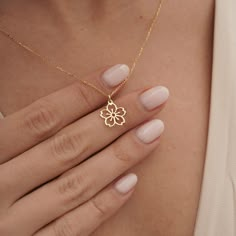 The cherry blossom flower is a symbol of hope, new beginnings, and the fleeting nature of life, making this necklace a meaningful and inspiring piece to wear. This exquisite necklace is a stunning piece of jewelry that captures the beauty of nature in all its glory. Crafted from luxurious 14k gold, the delicate sakura flower pendant shimmers and shines, reflecting the light with every movement. this 14k real gold cherry blossom flower necklace is meaningful that will stand the test of time. Wear Necklace Real Gold, Gold Flower Necklace, Cherry Blossom Necklace, Birth Flower Necklace, New Gold Jewellery Designs, Murano Art, Fancy Jewelry Necklace, Pretty Jewelry Necklaces, Fancy Jewellery Designs