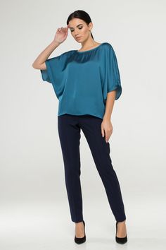 "A soft satin blouse featuring a boat neckline, half dolman sleeves, loose silhouette, and a relaxed fit. - kimono style blouse - loose silhouette - boat neck - half sleeves - Color: blue Fiber: 30% viscose, 70 % polyester. You may feel free choosing the size. Just send us your measurements (bust, waist, hips, height). We will define your correct size. SIZE CHART XS __ EU 34 __ US 4 bust: 31,5\" | 80 cm waist: 24,5\" | 62 cm hips: 34,5\" | 88 cm S __ EU 36 __ US 6 bust: 33,0\" | 84 cm waist: 26, Boat Neck Top Patterns, Loose Tops For Women, Luxury Blouse, Blouse Satin, Boat Neck Blouse, Batwing Sleeve Blouse, Blue Kimono, Pink Summer Dress, Boat Neck Tops