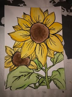 a drawing of a sunflower with green leaves