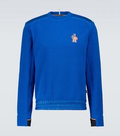 This electric blue crewneck sweatshirt from Moncler Grenoble is made from technical fleece, featuring padded details at the shoulders and an elasticated hem. | MONCLER GRENOBLE Fleece logo sweatshirt