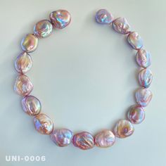 One picture corresponds to one product.  1 Strand 16 inches（40.6cm) Button Baroque pearl necklace Pearl size:  17.2mm-20mm（W)      21.2mm-23.6mm（L)     9.5-12.5（THK） Pearl color: Natural Purple Rainbow，strong natural metallic. Holes:  go though The luster and shape of this batch of purple rainbow button baroque pearl necklaces are very pretty. I hope to provide high-quality services for your pearl jewelry design. Cheap Multicolor Round Bead Pearl Necklace, Cheap Multicolor Round Beads Pearl Necklace, Luxury Purple Pearl Necklace With Round Beads, Cheap Purple Pearl Jewelry, Luxury Purple Pearl Necklace, Luxury Purple Pearl Necklaces, Baroque Pearls Necklace, Purple Rainbow, Pearl Jewelry Design