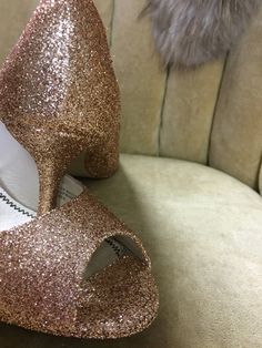 "These beautiful glitter high heels are covered in a rose gold glitter and sealed with a two step sealant that allows for movement and will not dull the shin of the glitter. This rose gold color is best described as a gold with a rose undertone. It is not an externally pink rose gold but does have a beautiful hint of pink undertones. Please note that the example heels in the photo are a size 8 shoe with a 3\" heel. Sizes 5-12 are available at checkout along with three different heel heights. All Glamorous Glitter Open Toe Wedding Shoes, Gold Open Heel Prom Heels, Wedding Glitter Accents Open Toe Heels, Wedding Open Toe Heels With Glitter Accents, Wedding Glitter Open Heel Heels, Open Toe Wedding Heels With Glitter Accents, Gold Closed Toe Heels For Prom, Gold Sparkling Heels For Gala, Gold Glitter Heels For Prom