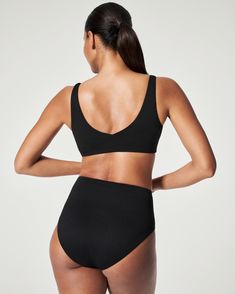 Designed with a beautiful textured fabric, this shaping high rise bottom was created to flatter every body. Featuring a unique design with flexible layers and no-dig leg openings, this style is equally as chic as it is sun and swim-friendly. | Spanx Women's SPANXshape Swim Pique Hi-Rise Cheeky Bottom High Waist Sculpting Bottoms With Seamless Construction, High-waist Sculpting Bottoms With Seamless Construction, High Waist Sculpting Seamless Bottoms, Sculpting High-waist Bottoms With Seamless Construction, Modern Fitted High-cut Leg Bottoms, High Rise Seamless Bottoms, Modern Fitted High-waist Swimwear, Chic Seamless High Waist Bottoms, Chic Seamless High-waist Bottoms