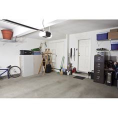 the garage is clean and ready to be used as a storage area for bicycles, tools and other things