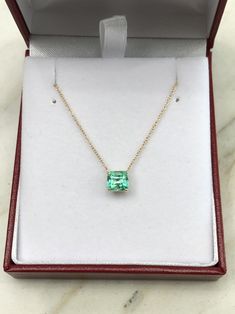 Featured here is a 1.32-carat stunning, Colombian emerald necklace in fine 14K yellow gold. Displayed in the center is a medium-light green emerald with incredible crystal clarity, accented by a simple four-prong gold mount, allowing for the emerald to be shown in full view. The earth mined, green Colombian emerald has a desirable lush green color with excellent qualities. An 18 inch is attached to the emerald pendant. This necklace is ideal for everyday use and is the perfect accessory to any o Exquisite Green Necklace With Brilliant Cut, Exquisite Emerald Necklace For Formal Occasions - May Birthstone, Exquisite Emerald Necklace For Formal Occasions And May Birthstone, Exquisite Formal Emerald Necklace For May Birthstone, 14k Gold Emerald Cut Fine Jewelry Necklace, Yellow Gold Solitaire Gemstone Necklace For Formal Occasions, Formal Yellow Gold Solitaire Necklace With Gemstone, Formal Emerald Birthstone Necklace, Fine Jewelry, Formal Fine Jewelry Emerald Necklace