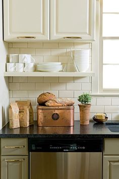 the kitchen counter is clean and ready to be used for baking or other cooking purposes