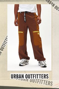 Paneled colorblock utility pants by Without Walls topped with oversized zip pockets at the front. Relaxed fit pants with an adjustable belted waist and cinch closures at the ankle cuffs. Urban Outfitters exclusive. Features Without Walls Trail Belted Utility Pant Utility pants from Without Walls Adjustable belted waist UO exclusive Content + Care 100% Nylon Machine wash Imported Size + Fit Model in Light Brown is 6’2.5" and wearing size Medium Measurements taken from size Medium Rise: 14" Inseam: 29" Leg opening: 11" | Without Walls Trail Belted Utility Pant in Light Brown, Men's at Urban Outfitters Fall Utility Pants For Outdoor Activities, Utility Pants For Outdoor Activities In Fall, Sporty Nylon Pants For Outdoor Work, Utility Cargo Style Sweatpants For Outdoor Activities, Utility Cargo Sweatpants For Outdoor Activities, Utility Pants With Belt Loops For Outdoor, Urban Parachute Pants With Belt Loops For Outdoor, Casual Nylon Cargo Pants For Outdoor Work, Urban Parachute Pants For Outdoor With Belt Loops