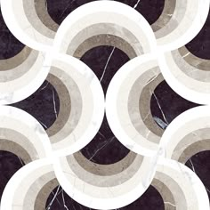 a black and white marble pattern with circles