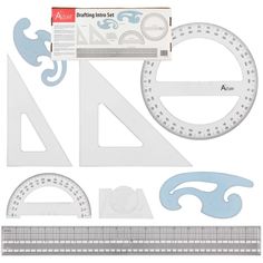 paper cutting tools including rulers, tape and other items to make a cutout for an ornament