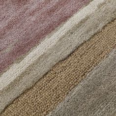 an area rug with different colors and textures