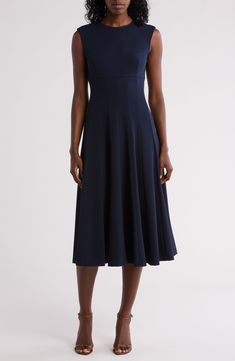 A timeless fit-and-flare silhouette makes this scuba crepe dress a perfect go-to for special occasions. 46 1/2" length Hidden back-zip closure Jewel neck Sleeveless Lined 66% polyester, 30% recycled polyester, 4% spandex Dry clean Imported Fitted A-line Crepe Midi Dress, Fitted Bodice Midi Dress In Elastane, Elegant Fitted Seamed Midi Dress, Elastane A-line Cocktail Dress, Fitted Seamed Midi Dress, Elegant Sleeveless Formal Dress, Cocktail A-line Elastane Dress, Fitted A-line Midi Dress In Crepe, Elegant Seamed A-line Midi Dress