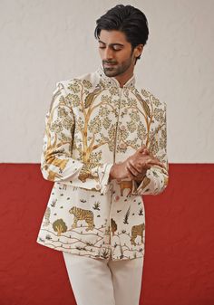 Step into sophistication with the Off White Jodhpuri suit. Crafted from georgette, the suit features a stunning multi-color resham and sequin work. The handwork on the collar and buttons adds an extra touch of elegance. Perfectly paired with matching pants. Perfect for special occasions like Sangeet, Mehendi, Haldi, or as a wedding guest outfit. Composition : Jodhpuri Jacket & Pant : Viscose Georgette Care: Dry Clean Only and Vacuum Storage This product can be customized for sleeves, length and White Jodhpuri, Jodhpuri Suit, Vacuum Storage, Indian Wedding Wear, Men Stylish Dress, Matching Pants, Asian Inspired, Guest Outfit, South Asian