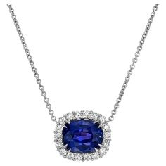 18K white gold necklace set with a 4.50 carat color changing Ceylon Sapphire from Blue to Purple, and a cluster of 0.57 carat round brilliant diamonds. This Sapphire exhibits a change of color when viewed under daylight or fluorescent vs incandescent light. The GIA gem report is attached to the image selection for your reference. Returns are accepted and paid by us within 7 days of delivery. Please FOLLOW the MERKABA storefront to be the first to view the latest of our ultra exclusive jewels and supreme gemstones. Merkaba Jewelry, is a unique, world-class jewelry brand, dedicated to unveiling the rarest, finest and most sought-after gemstones globally, such as Alexandrite, Paraiba Tourmaline, "no oil" Emeralds, unheated Sapphires and Rubies, Padparadscha Sapphire, Aquamarine, Tsavorite, Sp Class Jewelry, Chrome Tourmaline, Color Change Sapphire, Spiritual Necklace, Demantoid Garnet, Incandescent Light, White Gold Necklace, Bespoke Engagement Ring, Padparadscha Sapphire