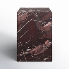 a brown marble block on a white background