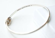 This custom hand stamped womens bangle is the perfect gift for her birthday or anniversary!  Your individual personalised message is custom stamped on the inside of the sterling silver bangle, and lovingly crafted into a bangle in my little UK studio.  Add your Rings! Rings represent years - choose from Sterling Silver, 9ct Yellow Gold or 9ct Rose Gold to create a your very special gift.  Sterling Silver Rings - £4 each 9ct Yellow or Rose Gold rings - £10 each  e.g. For a 40th birthday you c... Elegant Silver Bracelets For Anniversary Gift, Personalized Sterling Silver Bangle For Anniversary, Engraved Sterling Silver Bracelet For Anniversary, Elegant Sterling Silver Bracelet With Engraving Option For Gift, Elegant Sterling Silver Bracelet With Engraving Option, Modern Personalized Bangle As Gift, Elegant Hand Stamped Bracelets For Anniversary, Personalized Silver Bangle For Anniversary, Anniversary Sterling Silver Hallmarked Bracelet