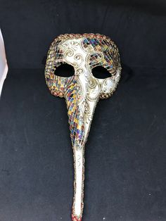 Venetian Mask Masquerade for Men or for Women - Traditional and original papier-mache Venetian mask, handmade and decorated with acrylics colors , stucco (stuggles ) and glitter All our masks are handmade papier-machè masks made in Venice. Our decorators use techniques typical of the Venetian tradition such as stucco, acrylics, gold and silver-leaf, macramè, passementerie, glitters and crequelè to offer you a wide range of original handmade masks and decorations This shape is available in differ Artistic Masks And Prosthetics For Mardi Gras Carnival, Multicolor Masks And Prosthetics For Masquerade And Carnival, Multicolor Masks And Prosthetics For Carnival Masquerade, Multicolor Masks For Masquerade Carnival, Multicolor Masquerade Mask For Carnival Festivals, Artistic Multicolor Masquerade Mask For Mardi Gras, Artistic Multicolor Masquerade Mask For Carnival, Multicolor Masquerade Mask For Carnival, Multicolor Masquerade Mask For Mardi Gras