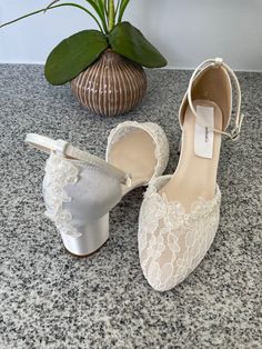 "Classic Wedding comfortable block 2 1/4\" heel shoes, front lace and satin heel adorned with a beautiful beaded with pearls edging embellishment, please look at the pictures. available in sizes: 5M to Please look at all the pictures! contact for additional questions, or concerns. NO RETURNS NO EXCHANGES, FINAL SALE, PLEASE CONTACT FOR ANY QUESTIONS CONCERNS." Elegant Low Heel Wedding Shoes With Lace Trim, Formal Wedding Shoes With Lace Trim And Closed Toe, Lace Closed Toe Heels With Lace Trim, Lace Heels With Lace Trim For Wedding, Lace Low Heel Wedding Shoes, White Lace Ankle Strap Wedding Shoes, White Lace Wedding Shoes With Ankle Strap, White Lace Heels With Round Toe, Lace Wedding Heels With Round Toe