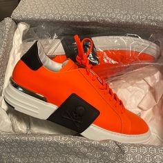 Mens Philipp Plein Salmon Colored Lo Top Sneakers. Brand New, Never Worn. Still In Original Bag. Comes With Original Box, Dust Bag, Tissue, Bags. Purchased In Vegas. Originally $630. Designer Calf Leather Sneakers For Streetwear, Red Leather Custom Sneakers With Perforated Toe Box, Designer Sneakers With Contrast Sole, Luxury Custom Sneakers With Contrast Sole For Sports, Luxury Orange Sneakers, Designer Custom Sneakers With Contrast Sole In Calf Leather, Designer Custom Sneakers With Contrast Sole For Streetwear, Designer Low-top Custom Sneakers For Streetwear, Designer Custom Low-top Sneakers For Streetwear