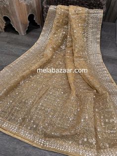 Lightweight and soft organza dupatta with gold zari embroidery jaal and broad border. The shimmering zari threads create a beautiful contrast against the sheer organza fabric. Luxury Sequin Fabric With Sheer Dupatta For Parties, Luxury Sheer Organza Dupatta, Luxury Organza Dupatta For Ceremony, Luxury Gold Dupatta With Zari Weaving, Gold Tussar Silk Lehenga With Dupatta, Gold Lehenga With Dupatta In Tussar Silk, Gold Tussar Silk Lehenga With Zari Work, Unstitched Gold Organza Suit, Gold Unstitched Organza Suit