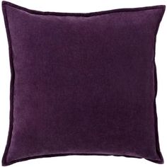 a purple pillow on a white background