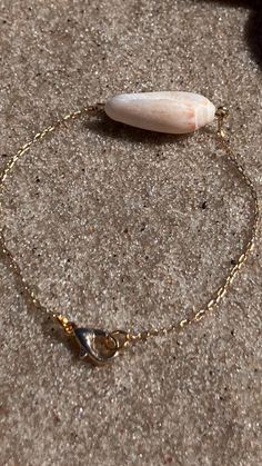 A tiny olive snail shell on a delicate chain :) Adjustable Shell-shaped Beachy Bracelets, Elegant Shell-shaped Bracelets, Adjustable Shell-shaped Bracelet For Beach, Adjustable Gold Shell-shaped Bracelet, Adjustable Gold Shell-shaped Necklace, Snail Shell, Shell Bracelet, Chain Link Bracelet, Chain Link