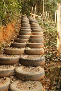 many old tires are stacked on each other