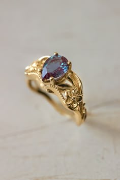 Alexandrite engagement ring, art nouveau ring / Eloise | Eden Garden Jewelry™ Gold Pear Cut Engagement Ring, Fantasy Rings, Engagement Ring Flower, Art Nouveau Engagement Ring, Engagement Ring Nature, Pear Cut Engagement Ring, Woman Flower, Nouveau Wedding, Art Nouveau Weddings