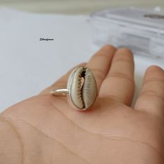 Natural Money Cowrie Sea shell ring, handmade ring, gift ring, Natural Sea shell ring, boho ring, women's ring, statement ring, Gift For Her Benefits Of Gemstone : It brings good luck, wealth, prosperity, fame and the power of destiny. Cowry shells are used in some religious or auspicious ceremonies too, like in Laxmi puja Kaudi shells are kept to please Goddess Laxmi and be blessed by Her and Lord Vishnu Those who have these cowries with them during prayer gets the blessing for both Lord Shiva and Goddess Lakshmi and they gain success, prosperity, wealth and fame in life. Cowries are also used as a tool to save children from evil and negativity. Thanks For Visiting My Shop. Bhagirath Nickel-free Shell Gift, Silver Shell-shaped Rings For Beach, Silver Shell Rings For Beach, Sterling Silver Beach Ring Jewelry, Sterling Silver Beach Ring, Silver Shell-shaped Ring For Gift, Beach Sterling Silver Ring, Silver Shell Rings For Gift, White Beach Ring Jewelry