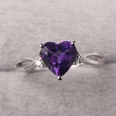 ◆ The ring is handcrafted from sterling silver and decorated with a dazzling 8*8 mm amethyst and CZs. It is suitable for engagement/anniversary/daily occasion. ◆ Production Description: Main stone Type: Natural Amethyst Main Stone Shape: Heart Cut Main Stone Size: 8*8 mm(1.78ct) Side stone: CZ Metal: 925 Sterling silver - Other options available in the drop down menu ◆ Customization: √Free for Add Engraving √Other Metal Type Available √Other Gemstones & Shapes Available √Personalization Requests Heart Cut Amethyst Ring With Accent Stones, Silver Amethyst Ring For Valentine's Day Gift, Sterling Silver Heart Shaped Amethyst Ring For Gift, Silver Heart Cut Amethyst Ring Gift, Heart Shaped Sterling Silver Amethyst Ring Gift, Heart-shaped Sterling Silver Amethyst Ring Gift, Silver Amethyst Heart Cut Ring Gift, Valentine's Day Purple Amethyst Promise Ring, Sterling Silver Heart Cut Amethyst Ring Gift